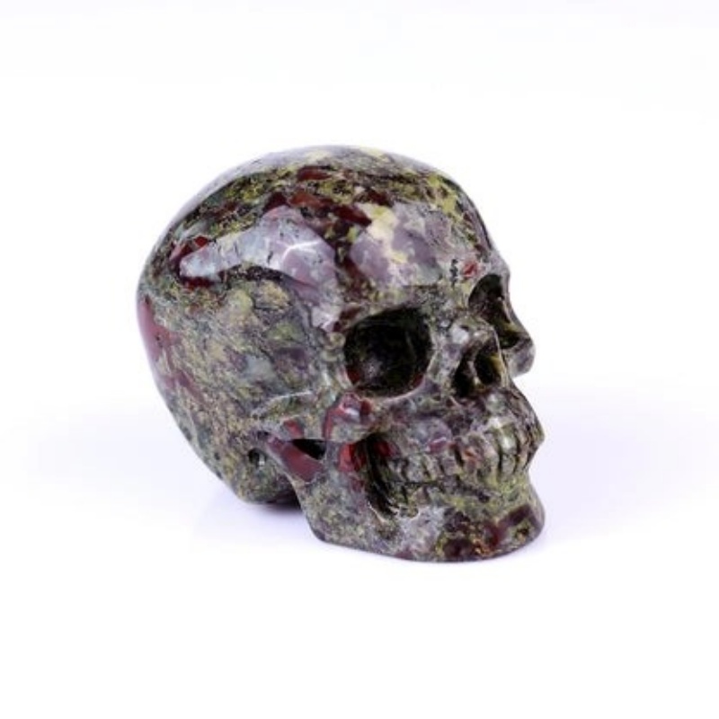Crânes sculptés à la main en héliotrope naturel pour commande en gros
