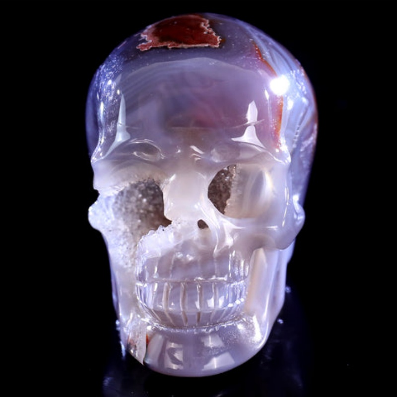 Sculpture de crâne réaliste en cristal d'agate de lave chaude naturelle sculptée à la main